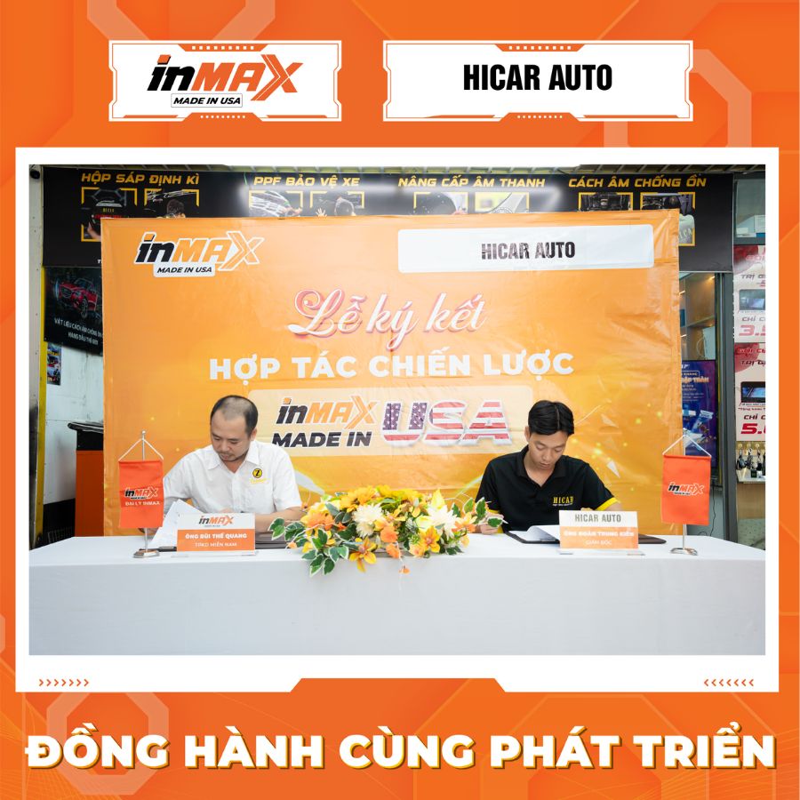 Đại diện Inmax Việt Nam và HiCar Auto cùng đặt bút ký kết thỏa thuận hợp tác